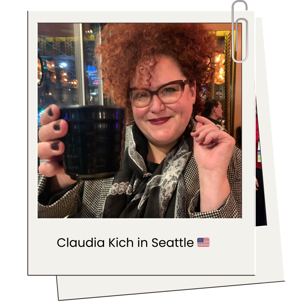 Claudia drinking coffee in Seattle