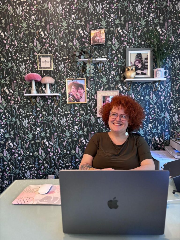 Claudia at her home office